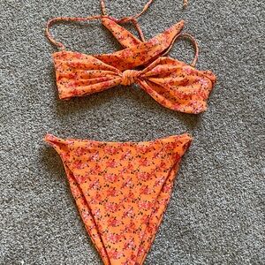 Skatie Bikini Set in Lyndi Top and Salty Bottoms in size Small in print Henali